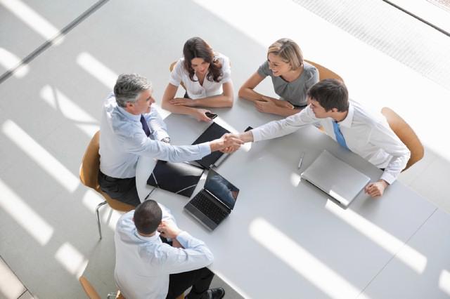 professional people shaking hands meeting